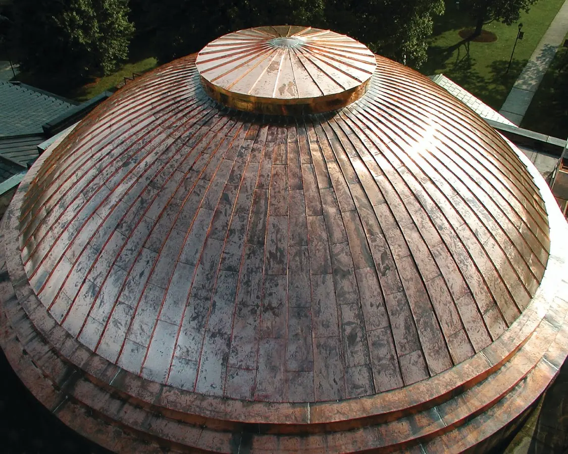 Craftsman Roofing crew installing a new roof in St. Elizabeth's